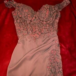 Off the shoulder, light blue with iridescent sparkles. From affair to remember